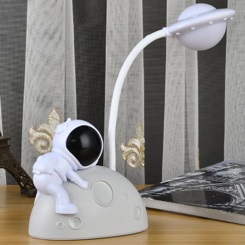 Astronaut LED Night Light: Moon Man Bedside Lamp for Student Dorms, Reading, and Desk Atmosphere.