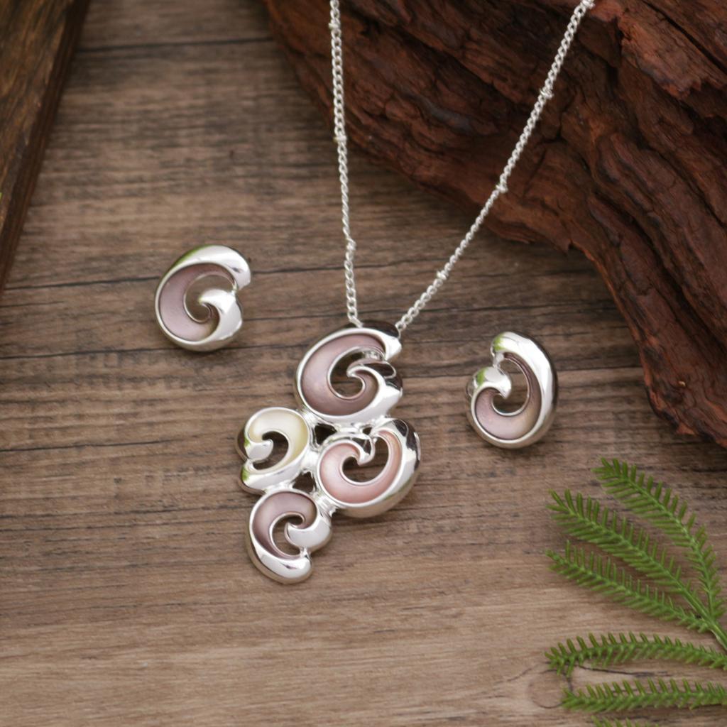 New enamel color hollow flower stud earrings pendant set, women's simple and high-end petal necklace