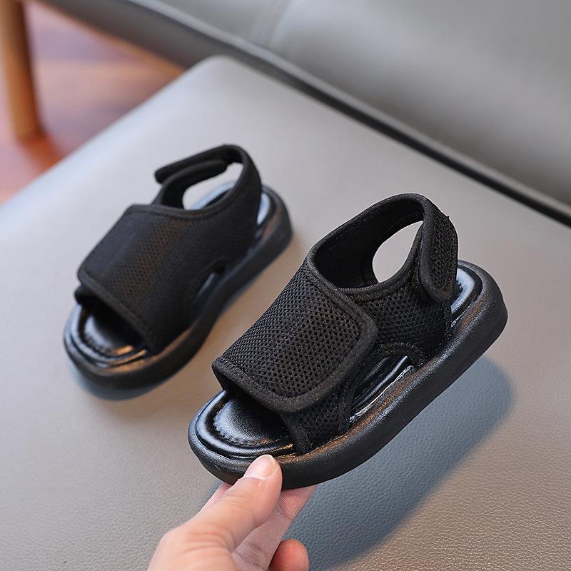 

Children s sandals, solid soft sole, unisex beach shoes for summer, mesh upper, solid color, soft sole. 30 чорний