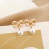 Trendy Pink Bow Pearl Clip-On Earrings - Korean Style Fashionable & Versatile New Arrival