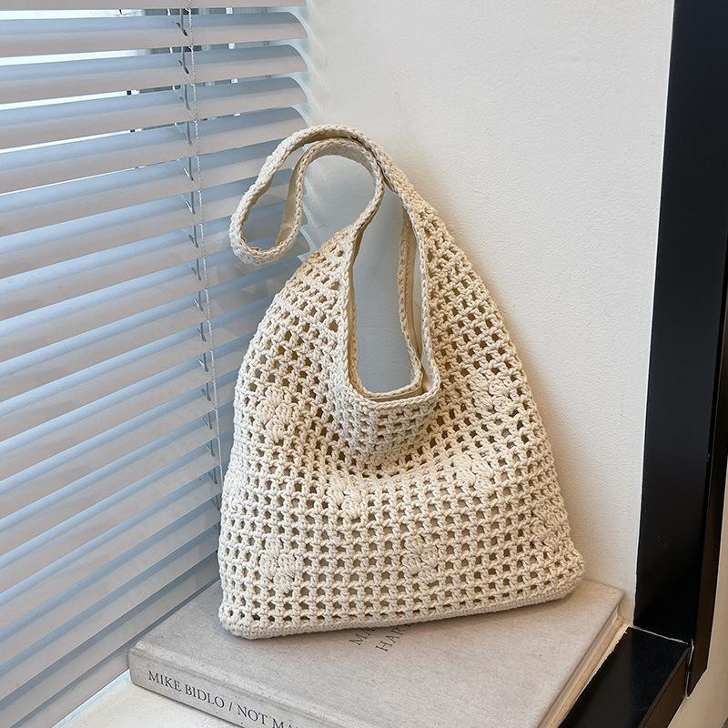Niche hollow bucket bag women's summer new fashion woven beach bag leisure vacation shoulder bag