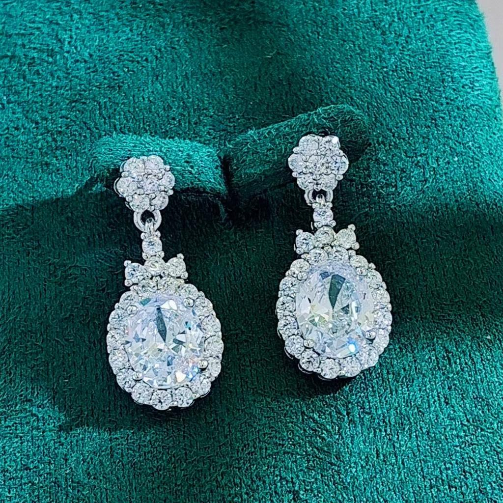 Fashion jewelry: full of diamonds, oval flower studs, exquisite temperament, earrings, light luxury, high-end earrings