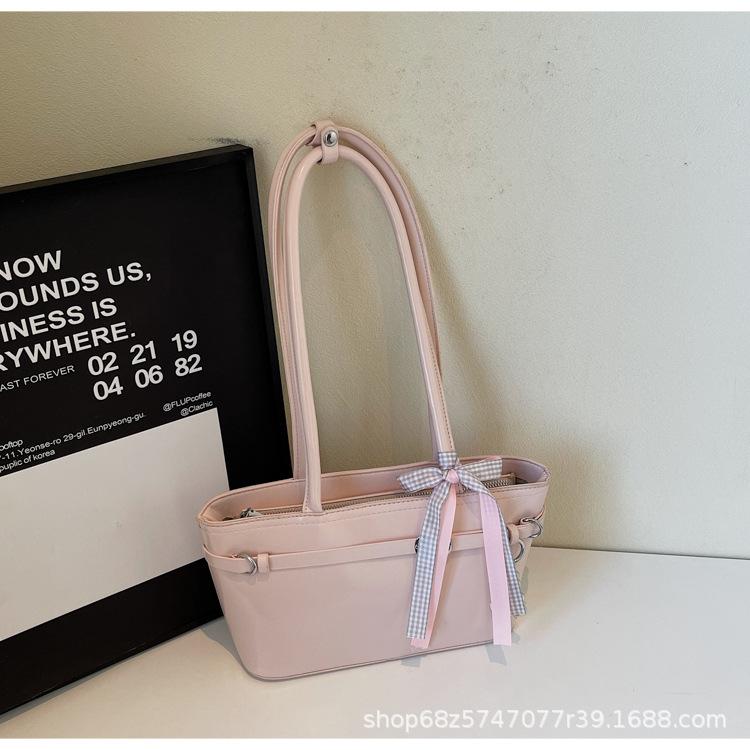 

Casual foreign style large-capacity bag women s 2025 new trendy and popular versatile fashion single shoulder commuter tote armpit bag рожевий