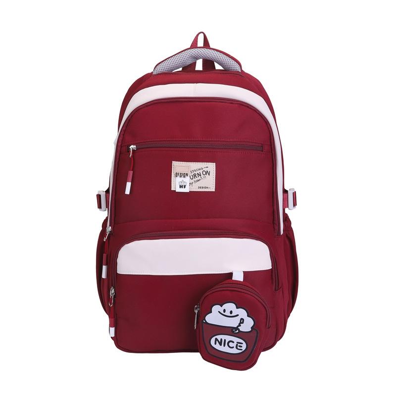 Simple and cute girl burden reduction backpack large size student schoolbag primary and secondary school students large capacity backpack