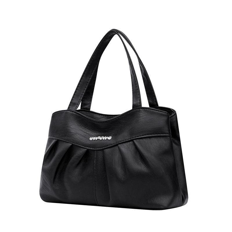 A Lady Commutes To and From Work with Her Mother's Bag In Hand