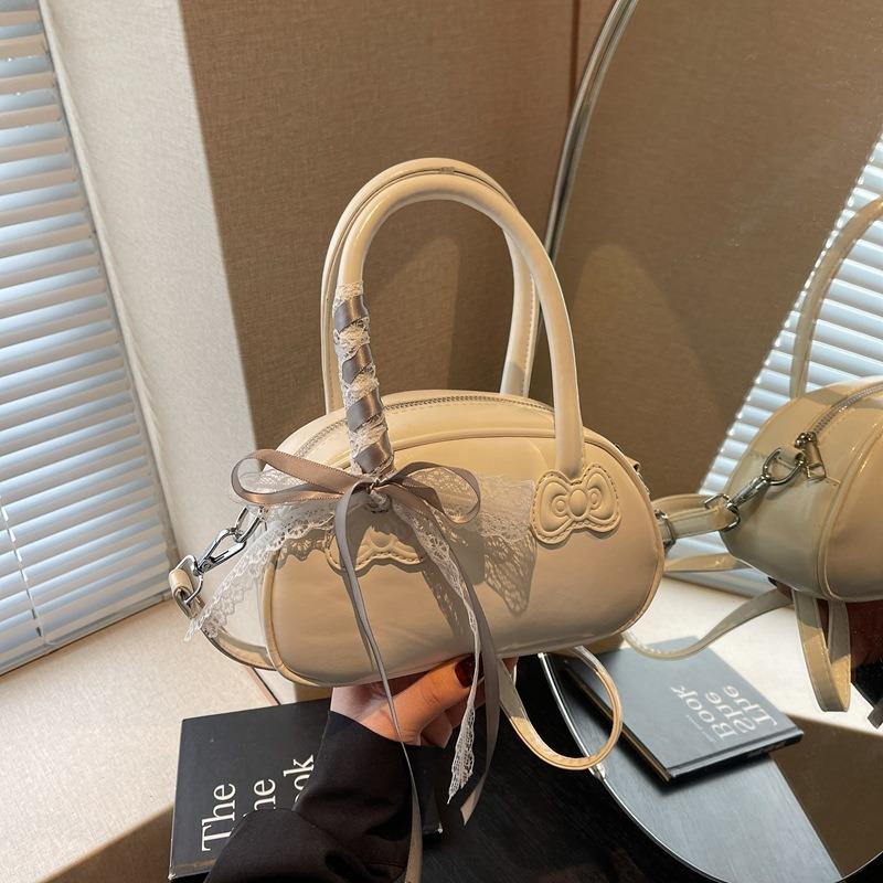 Spring and summer hand carry bow pillow bag women's new simple and fashionable shoulder bag high-end messenger bag
