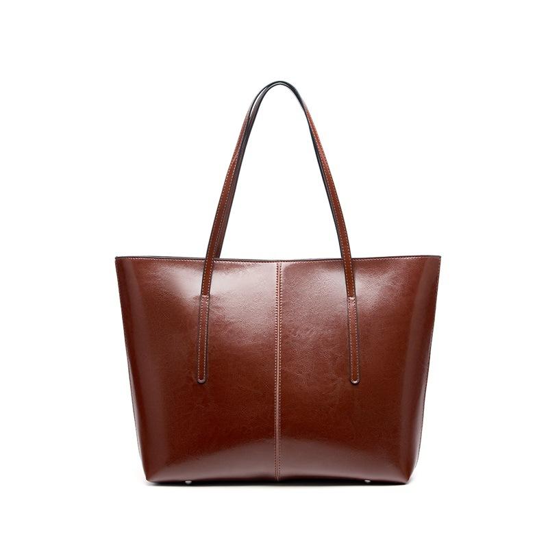 Large capacity leather tote bag, new versatile portable underarm bag, women's bag, niche shoulder bag.