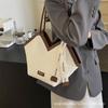 Retro mode dam 2025 sommar ny mångsidig liten väska dam axelbudväska texturerad sadelväska