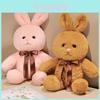 Cute Plush Bunny Toy With Soft Fabric And Colorful Ribbon Ideal For Kids Birthday Gifts