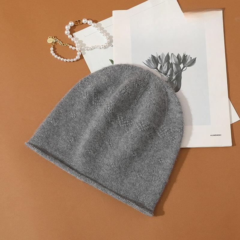 

Autumn and Winter New Men s and Women s Same Style Three Dimensional Pimple Curled Edge Ear Protection Warm Toe Cap Knitted Hat one size