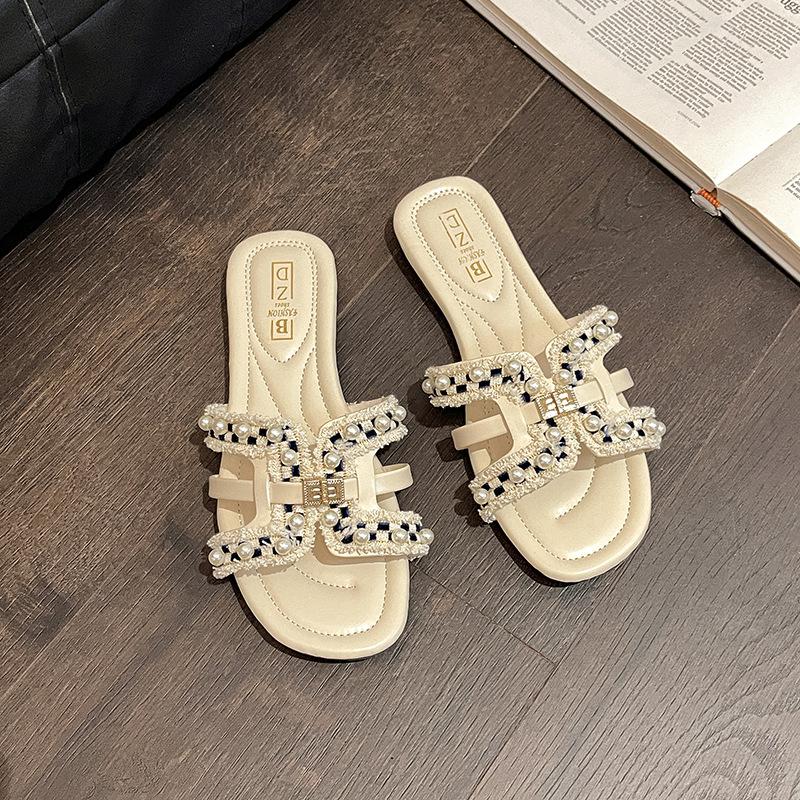 Xiaoxiangfeng plattbottnade coola tofflor dam sommar designkänsla mode bär fe-stil mjuk sula avslappnad pärla enords toffel