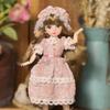 30cm BJD Toddler Princess Doll with Long Hair and Flower Accessory