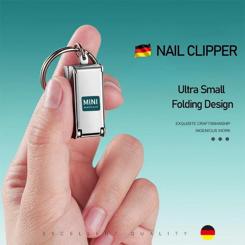 1pcs Keychain Stainless Steel Mini Nail Clipper with Nail File – Foldable Portable Luggage-Shaped Manicure Tool for Travel