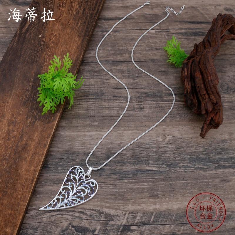 New enamel color hollow love long pendant, women's creative exaggerated heart-shaped versatile long necklace