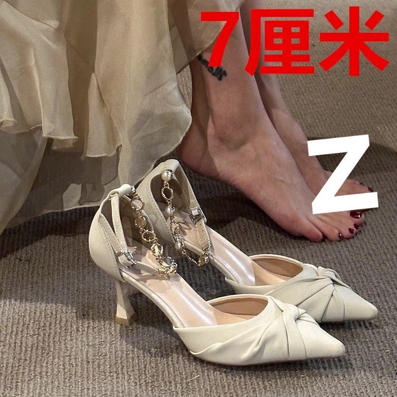 New black high heels women's design sense niche pointed pearl word with single shoes thin heel hollow