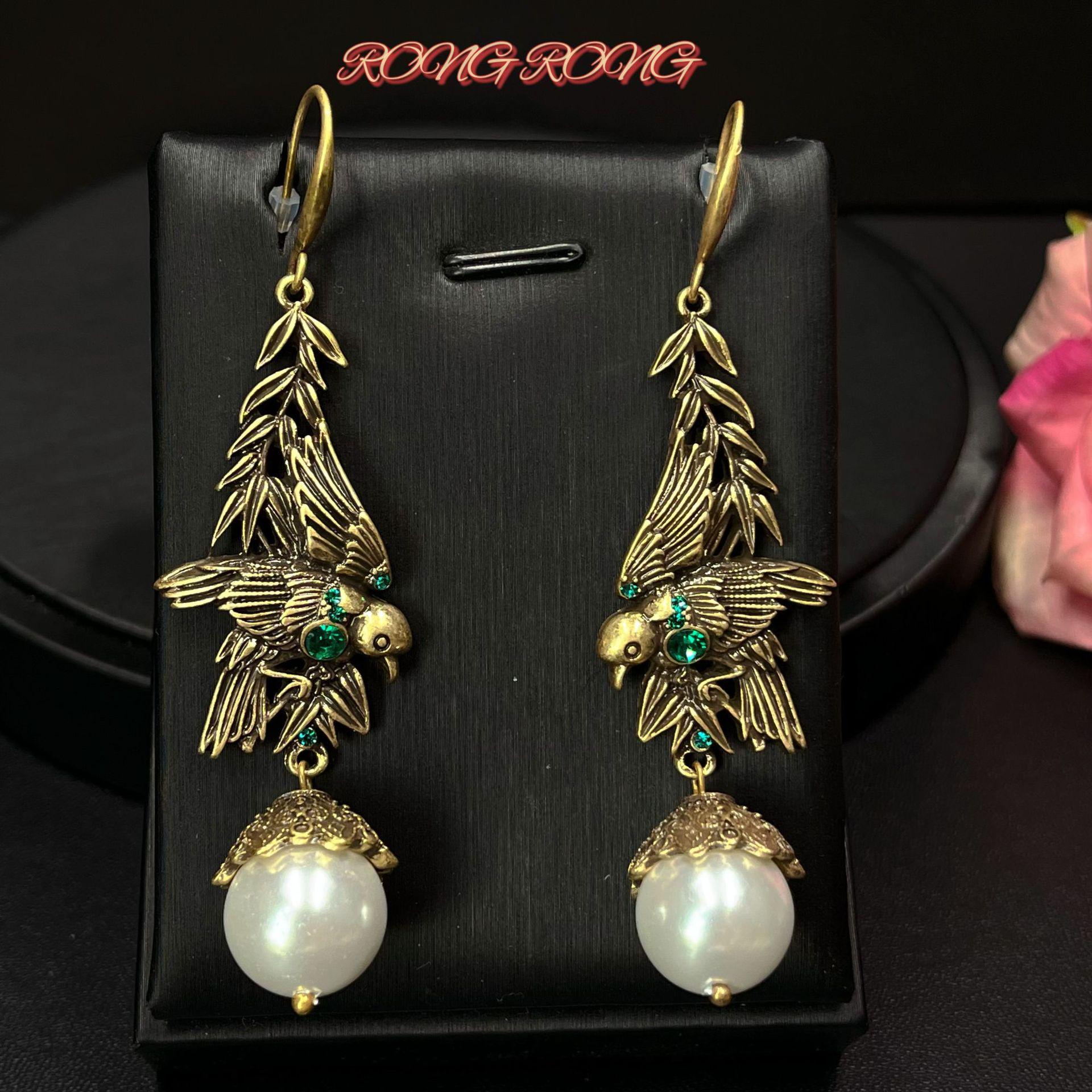 

Vintage European-American Heavy Industry Bird Pearl Leaf Dangle Earrings