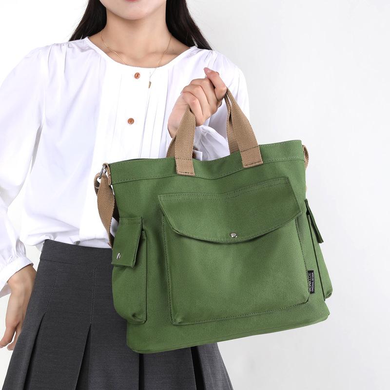 New Canvas Handheld Women's Bag 2025 Large Capacity Solid Color Canvas Commuting and Leisure Shoulder Korean Version Tote Bag