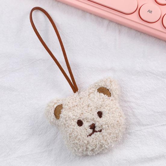 Precioso llavero con decoración de oso y cabeza con tacto acogedor