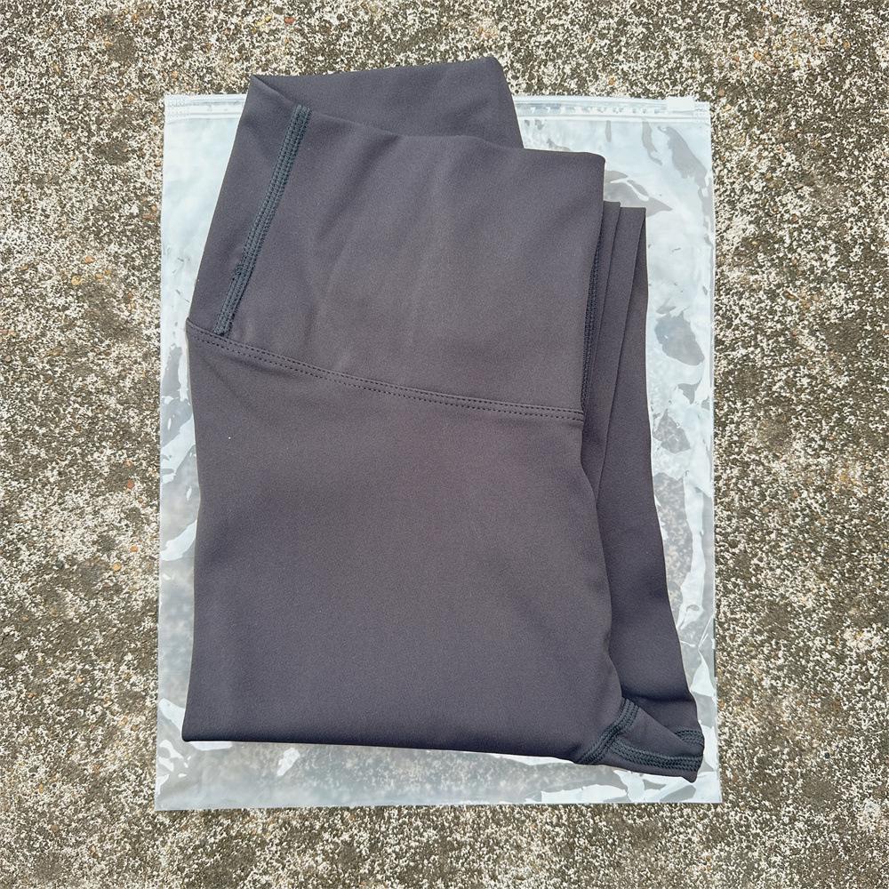 Solid Color High-Waisted Women's Yoga Leggings with Back Pocket – Soft, Elastic, and Peach Bum Enhancing