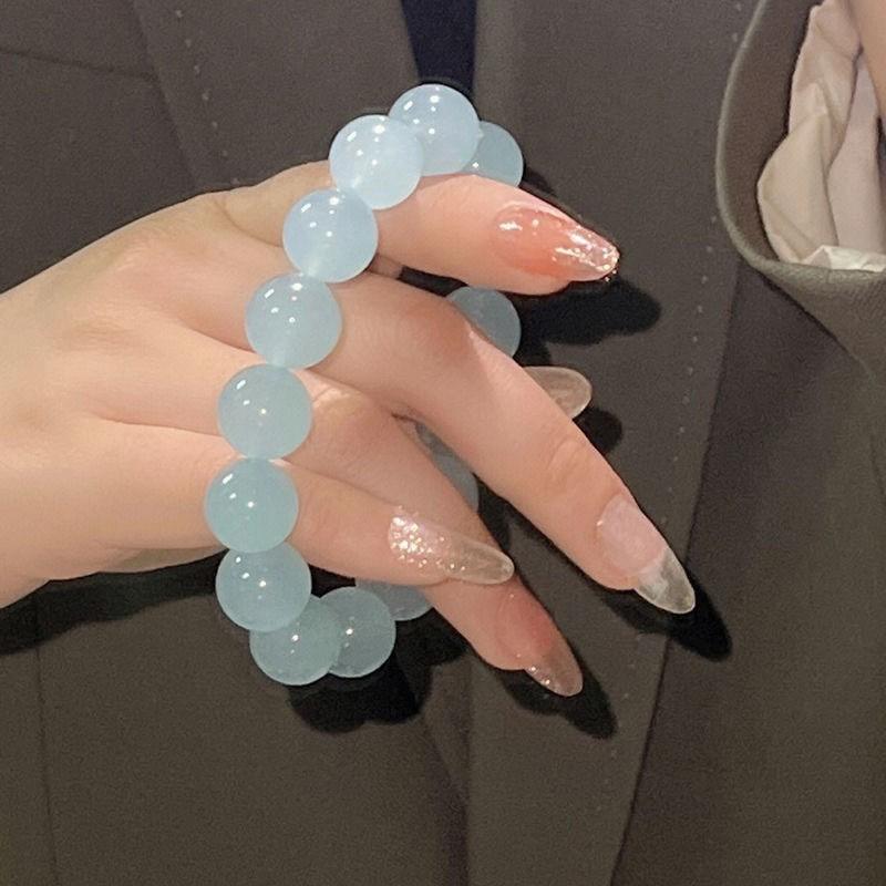 Xiaohongshu Style Soft Gradient Pink Bracelet for Students: Ice Transparent Finger Wrap Around Beads - Perfect for Gifting Besties.