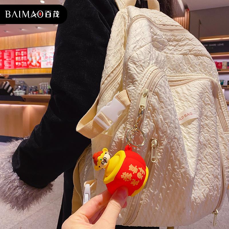 Noworoczny podskakujący Bóg Bogactwa świąteczny szczypiący muzyczny breloczek wisiorek wykwintny i uroczy męski i damski plecak szkolny breloczek do kluczy wisiorek z kółkiem