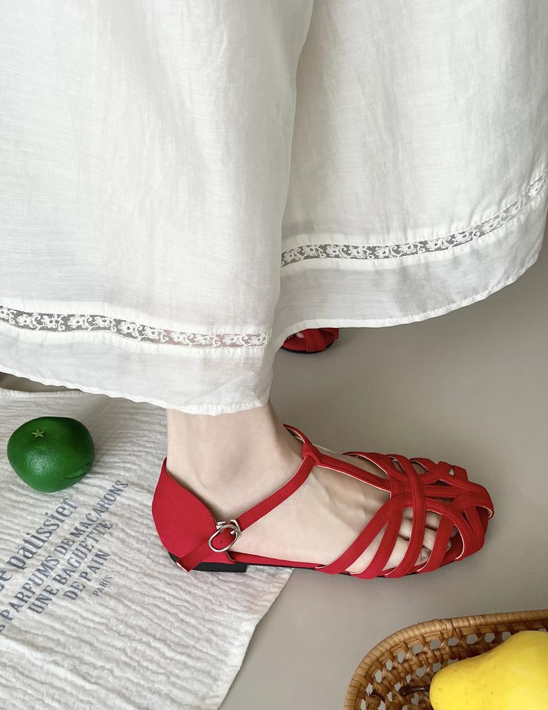 Leather hollow woven bag head Roman sandals women's literary style casual versatile comfortable flat T-button pig cage shoes