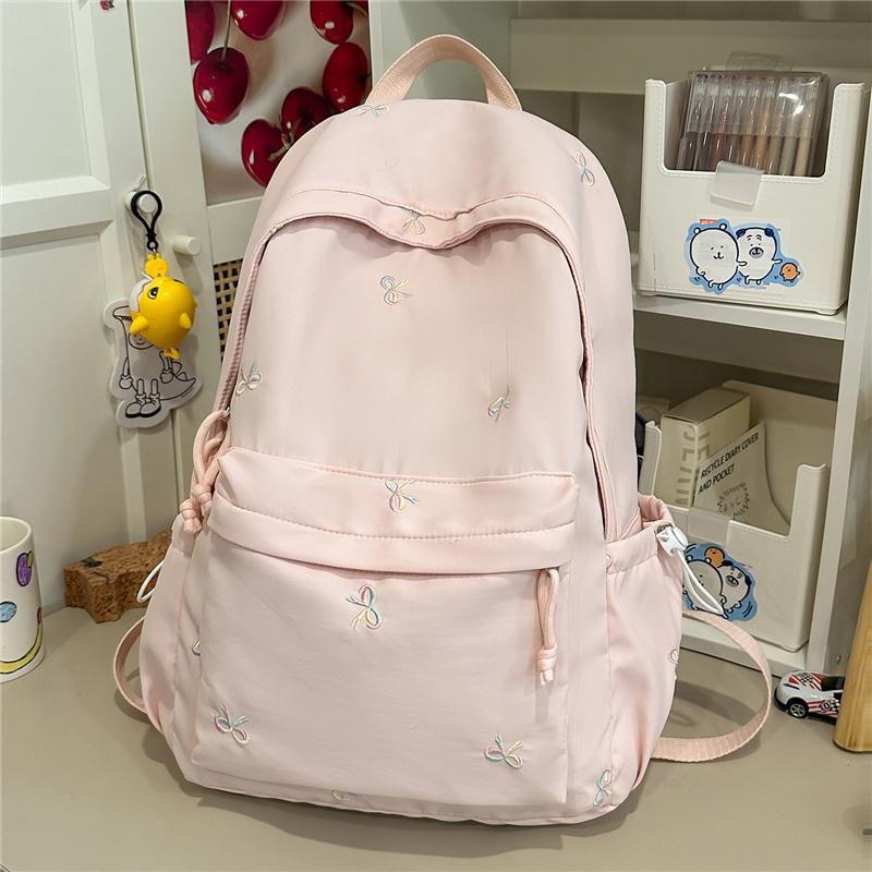 Zaino scolastico carino con ricamo a fiocco, tasca frontale, manico superiore, zainetto casual per uso quotidiano