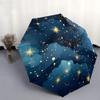 Un Ombrello Pieghevole con Design del Cielo Stellato. È un pratico accessorio da esterno adatto a qualsiasi stagione, che rende
