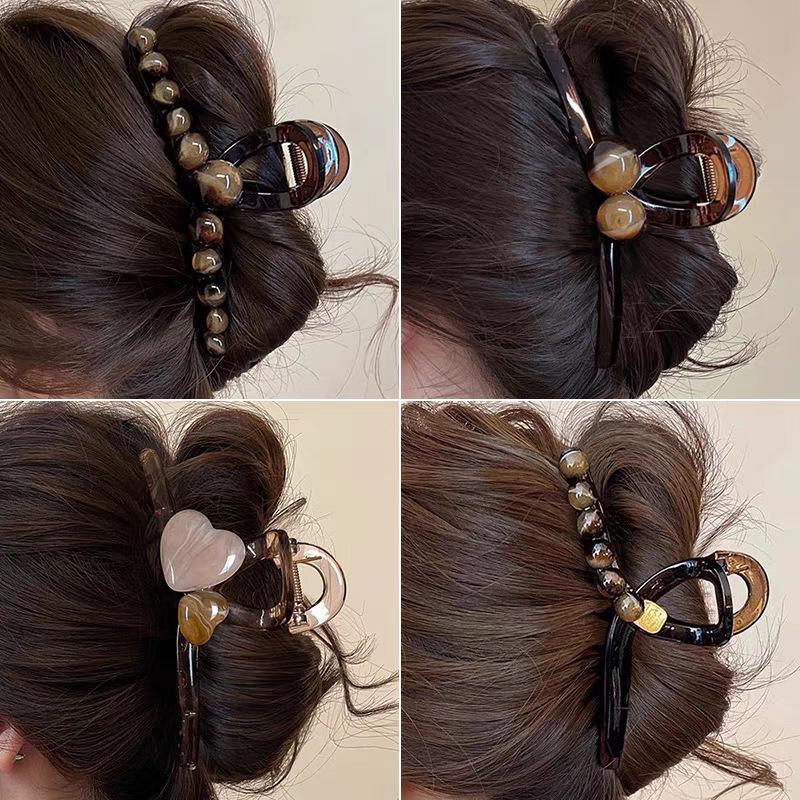 

Large High-End Textured Claw Clip - Elegant Hair Accessory for Influencers