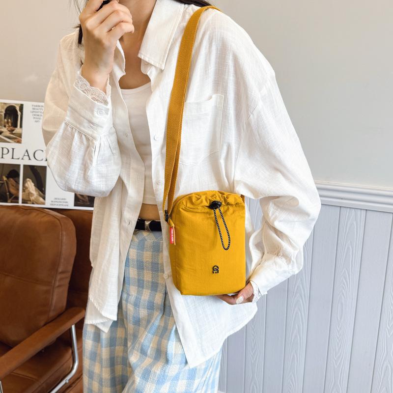 Canvas bag women's summer versatile new niche design messenger bag casual mobile phone bag