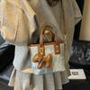 Nischen-Retro-Tasche Damen neue Frühling und Sommer vielseitige Umhängetasche exquisite tragbare Bucket Bag