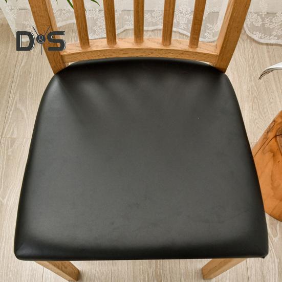 Pokrowiec na krzesło Wodoodporny Wysoka elastyczność Sztuczna skóra Antypoślizgowy Łatwa instalacja Ochraniacz siedziska Chroni przed zarysowaniami Zalania Olejoodporny Krzesło do jadalni