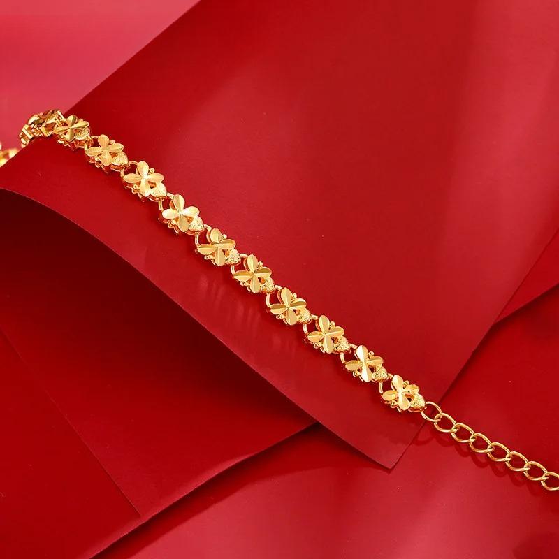 Bracelet vintage de luxe pour femme en or pur 24 carats (9999), orné d'un trèfle à quatre feuilles.