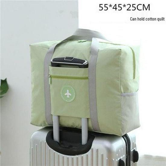 Compact travel bag: suitcase-compatible, hand-held, features an external pocket, handle slip-over design, with matching accessory bag.