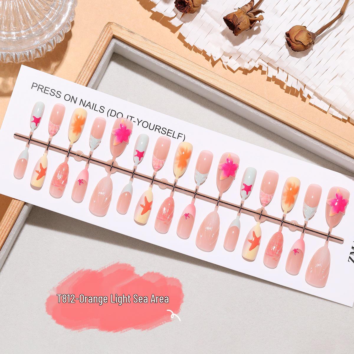 T812 Orange Light Sea Nail Stickers: Fresh Summer 3D Starfish & Flowers in Nude Pink Ins Style - Wearable Short Almond Design.
