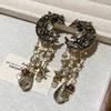 Pendientes de botón Vintage de Luna Dorada con Ángel y Borla de Cristal con Detalles de Esmalte
