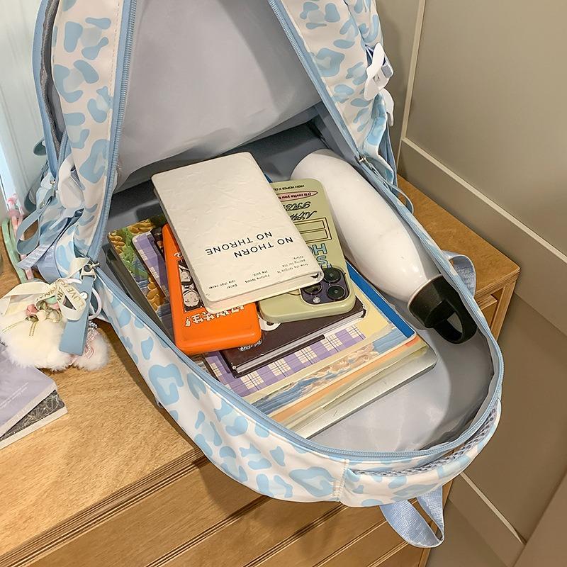 New Harajuku Cow Leopard Print Backpack, Light Make-up Class for Junior High School Students, and Large-capacity Backpack.