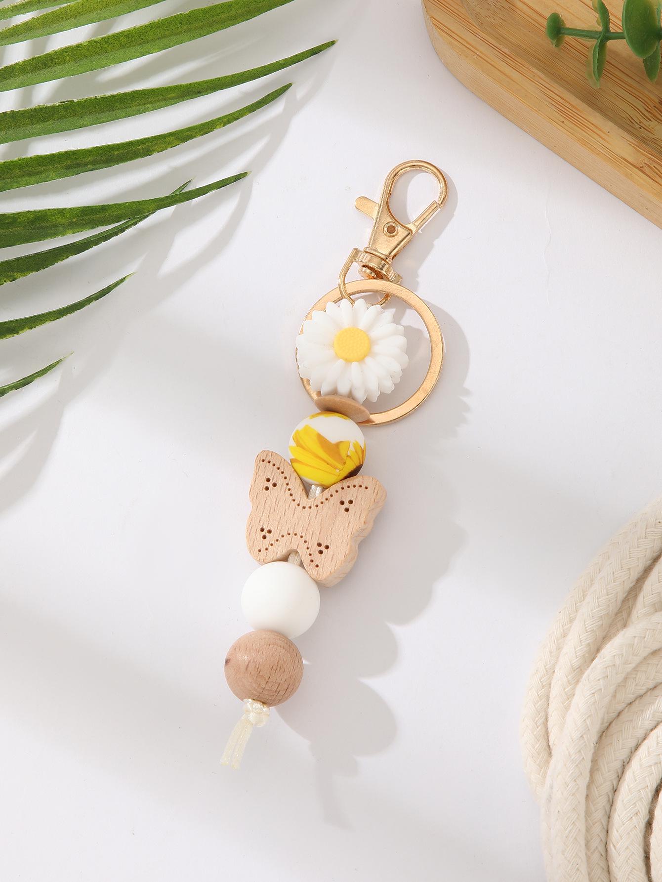 Silicone Beaded Keychain with Daisy, Wooden Butterfly Bracelet & Tassel Pendant