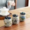 Portable Sealed Ceramic Tea Jar – Pottery Storage Canister with Plum, Orchid, Bamboo & Chrysanthemum Design