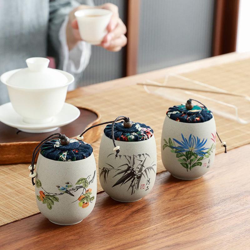 Portable Sealed Ceramic Tea Jar – Pottery Storage Canister with Plum, Orchid, Bamboo & Chrysanthemum Design