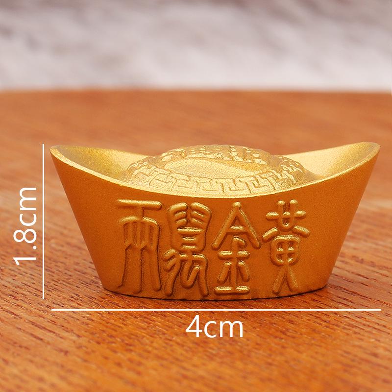 

Золотые слитки юаньбао с тиснеными узорами для богатства и процветания в декоре и экспозициях гостиной