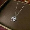 Women's Heart-Shaped Necklace with Four-Petal Flower, Cubic Zirconia, Titanium Steel Clavicle Chain - Elegant and Versatile Accessory