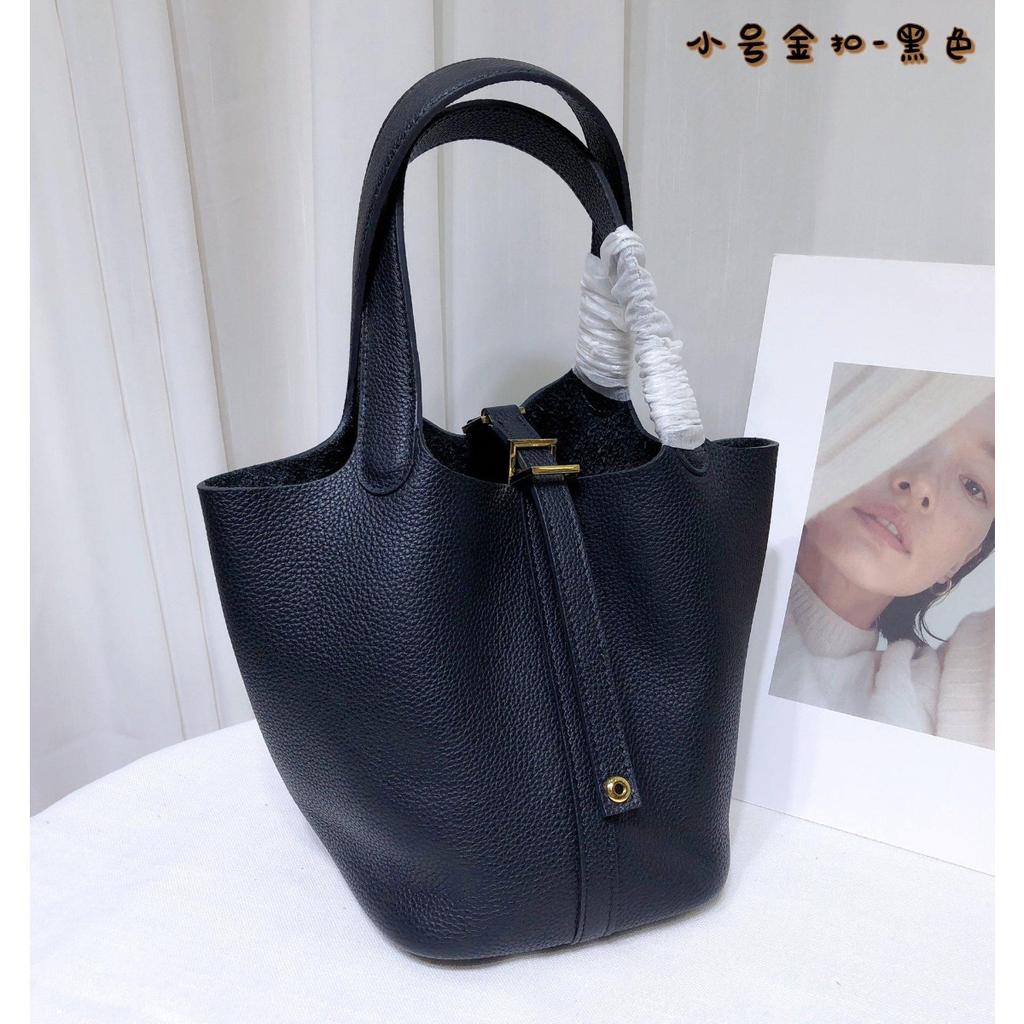 Spot wholesale top layer cowhide vegetable basket bag leather bucket bag commuter fashion lock buckle hand-held handbag woman