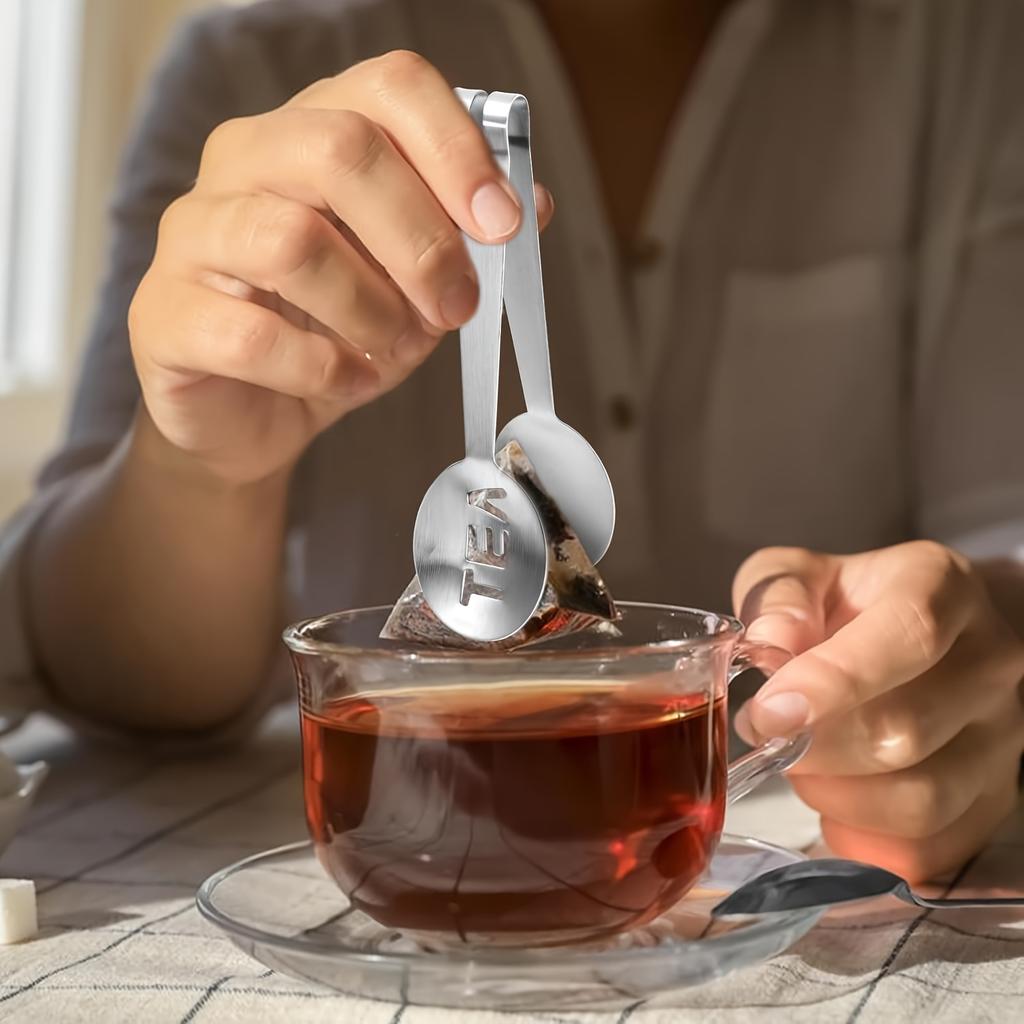 Teebeutelpresse aus Edelstahl, vielseitiges Küchenwerkzeug zum einfachen Lösen der Blätter, Griff für Eis und Zucker, langlebige Teebeutelzange, Siebclip