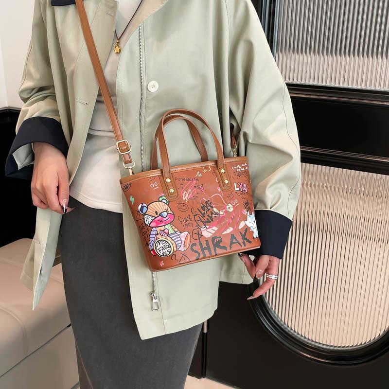 Große Eimer-Tasche aus PU für Damen mit Cartoon-Graffiti-Design, lässiger Streetstyle