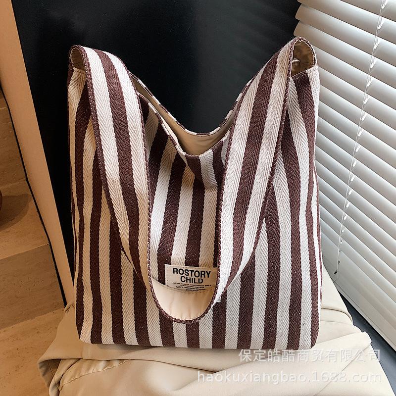 Large-capacity canvas bag women's 2025 new casual contrasting color versatile shoulder handbag, college student class tote bag