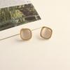 Elegant Chinese Cat's Eye Stone Ear Clips for Women - High-End Mosquito Coil Disc Earrings