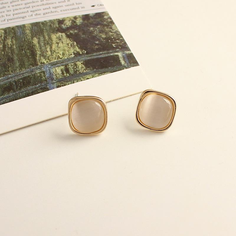 Elegant Chinese Cat's Eye Stone Ear Clips for Women - High-End Mosquito Coil Disc Earrings