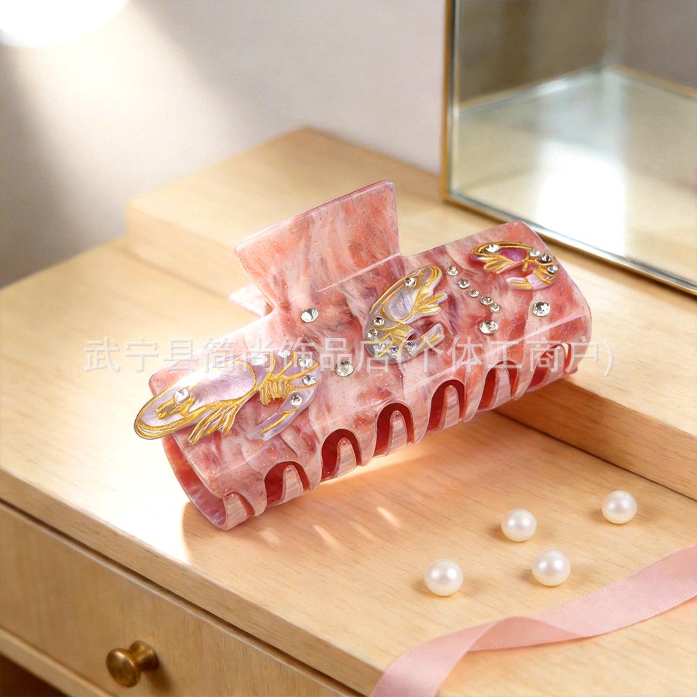 Elegancka spinka do włosów z cyrkoniami w kształcie rozgwiazdy i muszelkowa klamra do upięć