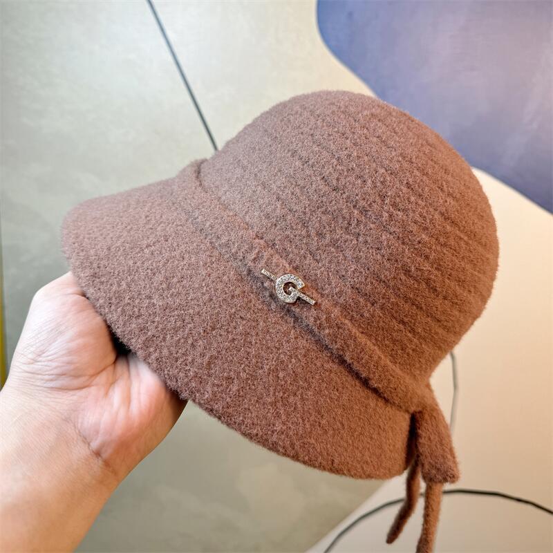 

Корейский стиль Осень и Зима Теплая Ленивый стиль Бант Шляпа рыбака Женская Защита ушей Вязаная Шапка-пуловер Ремешок Модная и Милая Adjustable